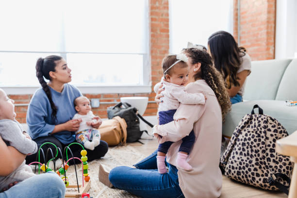 istock Four new mothers and babies meet together 1472625136
