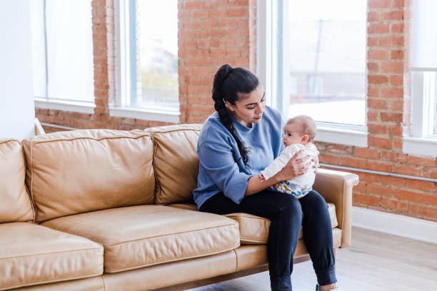 istock Young mom spends one-on-one time with baby 1472625143
