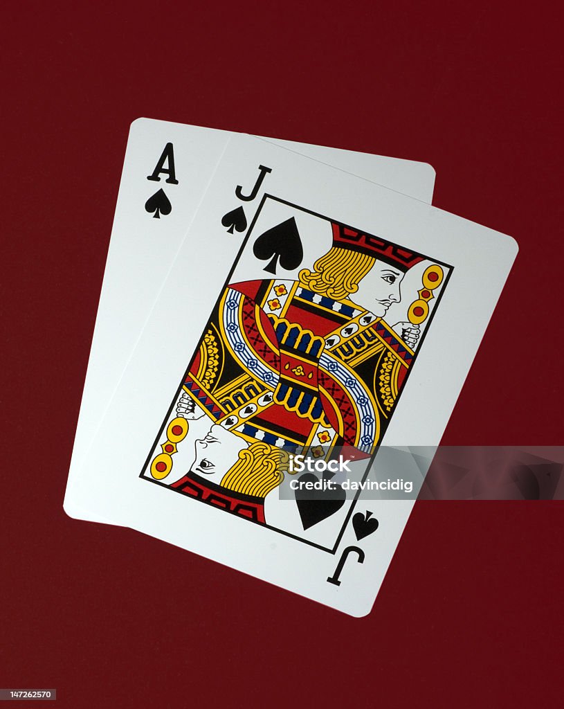 cards blackjack on red felt Ace Stock Photo