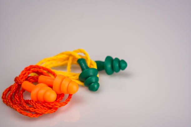 istock Earplugs, earmuffs, or ear protectors. 1472627066