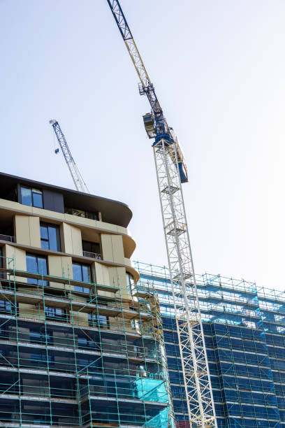 istock Construction of modern apartment building, background with copy space 1472633259