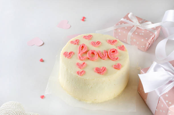 istock Trendy bento cake with cute decor on a light background. 1472635842