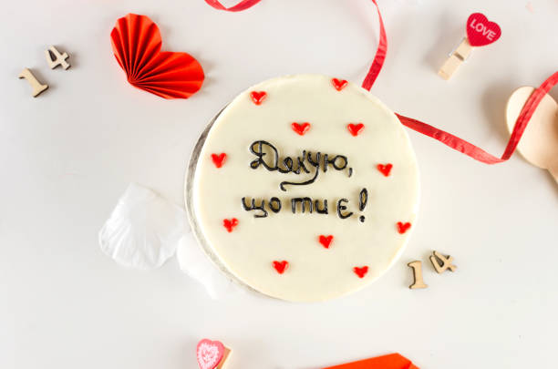 istock Trendy bento cake with cute decor on a light background. 1472635861