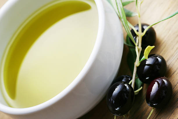 Olive oil and olives stock photo