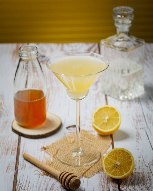 istock Bee's knees martini cocktail. Martini alcoholic cocktail or non-alcoholic mocktail. Martinis. 1472639210