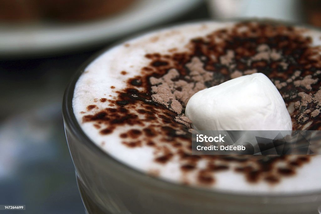 Marshmallow in Hot Chocolate Close-up of white marshmallow sinking into a cup of hot chocolate. 2000-2009 Stock Photo