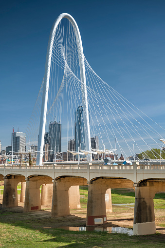 Margaret Hunt Hill Bridge and the pedestrian only Ronald Kirk Bridge crosses over the Trinity River leading into Dallas Texas USA