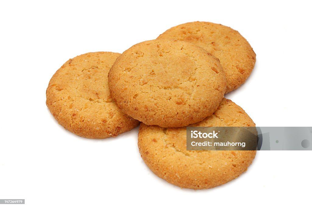 Cookies Many pieces of cookies stacked on white background. Baked Stock Photo