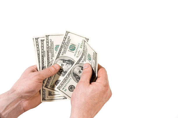 dollars in the hands stock photo