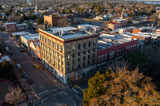 Aerial View of Brick Buildings in New Bern at Sunset in the Downtown Area