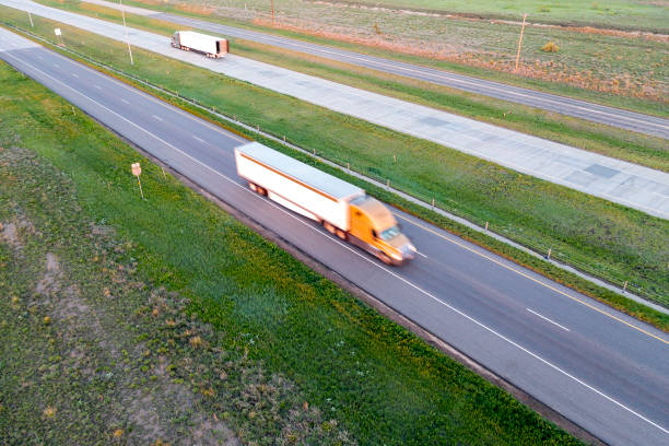 istock Trucks on US Highway, Aerial View 1472663088