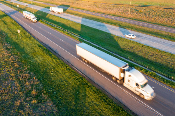 istock Aerial View of Trucks on US Highway 1472663476