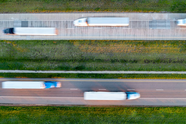 istock Trucks on US Highway, Aerial View 1472664703