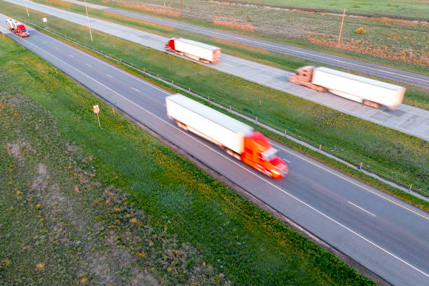 istock Trucks on US Highway, Aerial View 1472664987