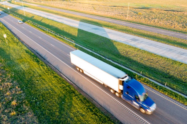 istock Trucks on US Highway, Aerial View 1472665680