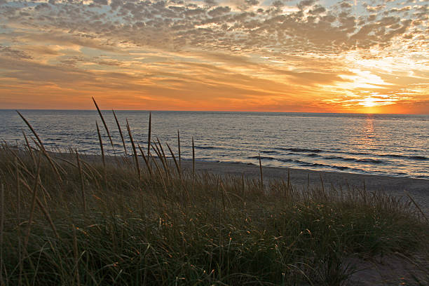istock Lake Michigan beach at sunset 147266932