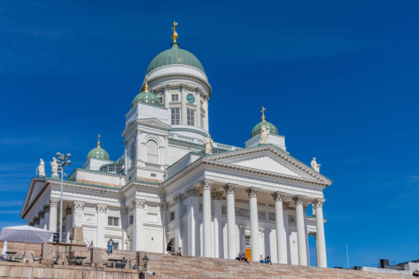 August, 2022. Helsinki, Finland. The main square of Helsinki in the old town on a sunny day with some tourists.