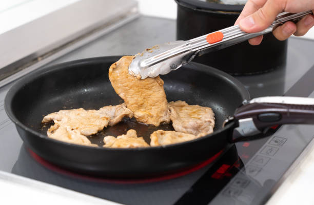 istock man in his 40s making ginger grill in the kitchen 1472670786