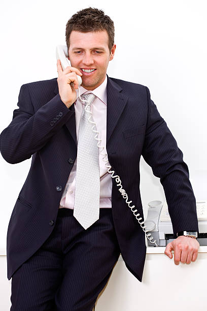 istock Businessman calling on phone 147267102