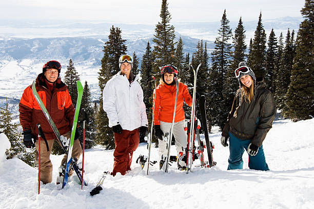 istock Skiers Standing in Snow Smiling 147267262