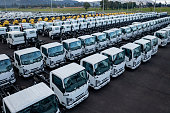 Trucks parked at a car dealership for sale