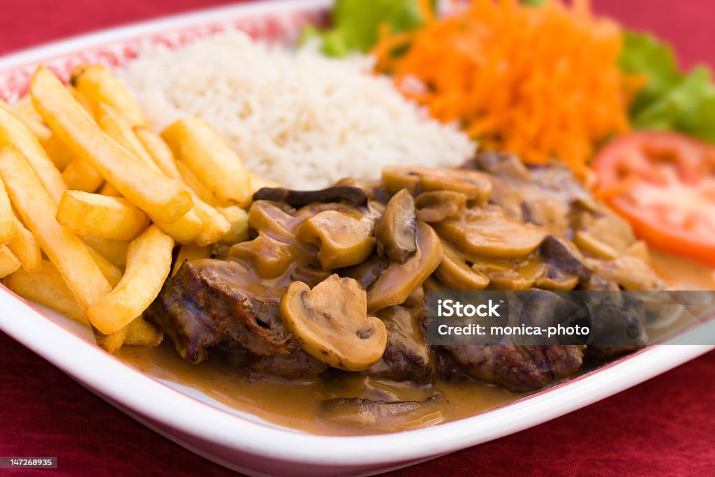 sirloin strip steak with french fries and rice sirloin strip steak with french fries and rice. Beef Stock Photo