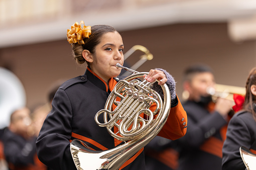 Brownsville, Texas, USA - February 26, 2022: Charro Days Grand International Parade, Members of the Charles Stillman Middle School Band performing at the parade