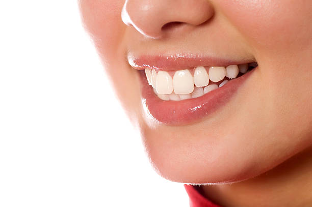 istock smiling young girl mouth with great teeth (isolated on white) 147269854
