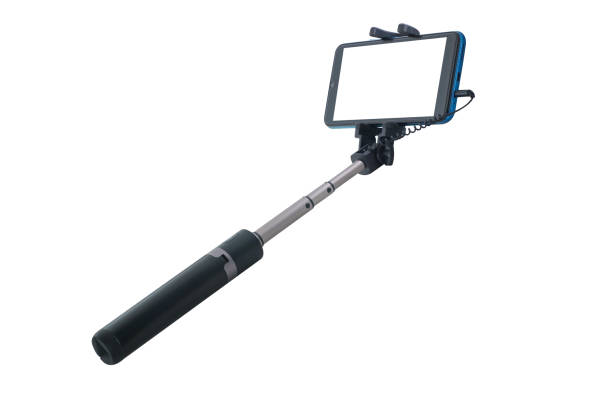 istock Tripod selfie stick with mobile phone. 1472701669