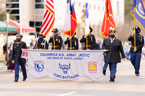Laredo, Texas, USA - February 19, 2022: The Anheuser-Busch Washingtons Birthday Parade, Members of the Cigarroa H.S. Army JROTC Toro Battalion, marching in full military uniforms