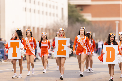 Laredo, Texas, USA - February 19, 2022: The Anheuser-Busch Washingtons Birthday Parade, United High School Cheerleaders performing at the parade