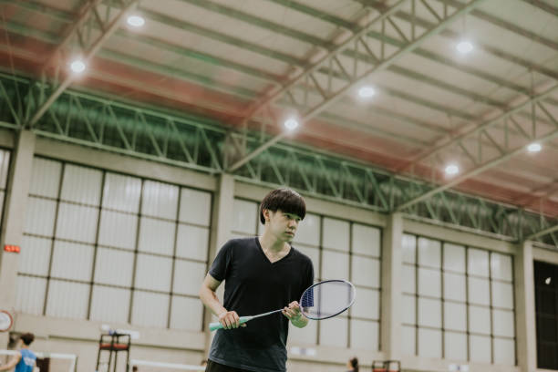 istock Thailand badminton player warm up and exercising before practicing. 1472711569