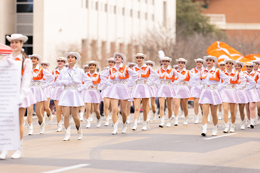 Laredo, Texas, USA - February 19, 2022: The Anheuser-Busch Washingtons Birthday Parade, The United High School Larriettes performing at the parade