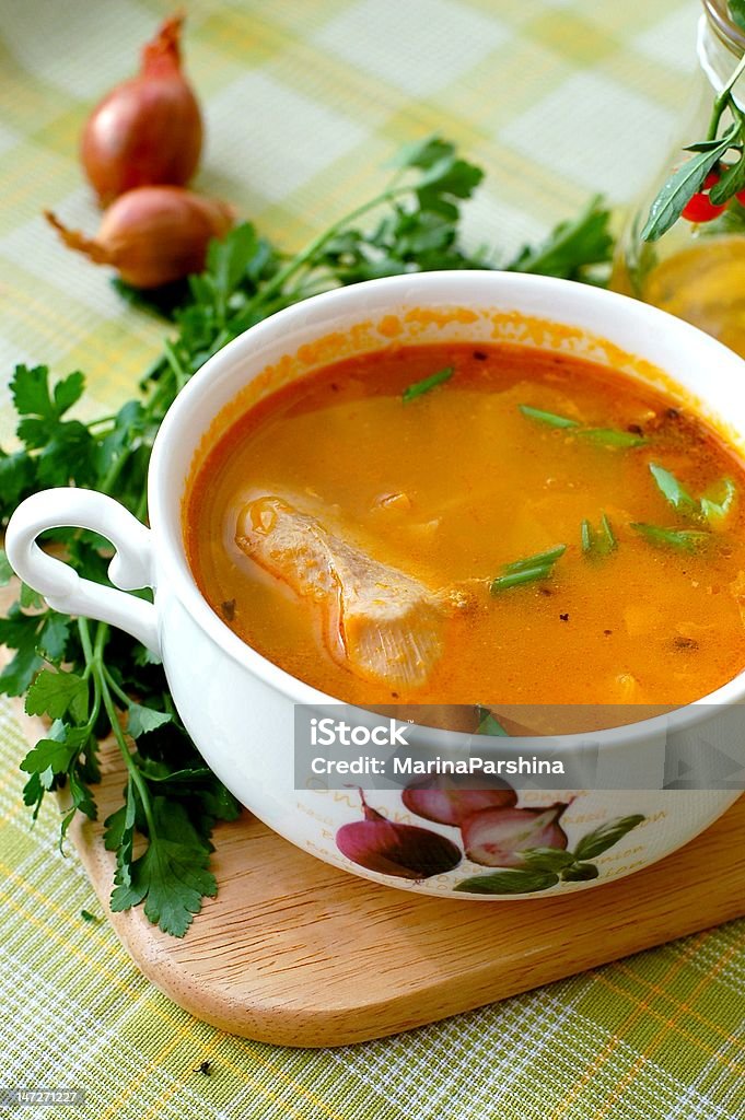 cabbage soup A white ceramic bowl of a just cooked cabbage soup. Chicken Soup Stock Photo