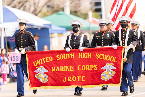 Laredo, Texas, USA - February 19, 2022: The Anheuser-Busch Washingtons Birthday Parade, Members of the United South High School Marine Corps JROTC, wearing full military uniforms, marching