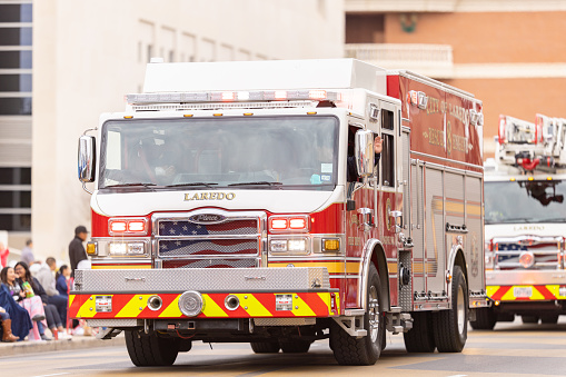 Laredo, Texas, USA - February 19, 2022: The Anheuser-Busch Washingtons Birthday Parade, Pierce fire truck leading the parade
