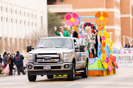 Laredo, Texas, USA - February 19, 2022: The Anheuser-Busch Washingtons Birthday Parade, Ford F-250 Pulling a float during the parade