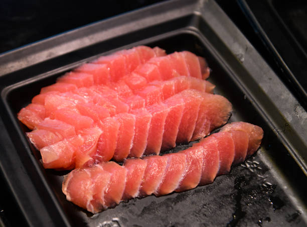 istock Raw fish sashimi at traditional market 1472715294