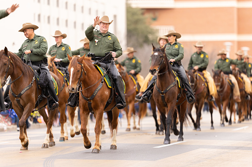 Laredo, Texas, USA - February 19, 2022: The Anheuser-Busch Washingtons Birthday Parade, Members U.S. Border Patrol Riding Horses