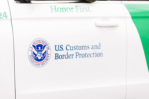 Laredo, Texas, USA - February 19, 2022: The Anheuser-Busch Washingtons Birthday Parade, Close up of the U.S. Customs and Border Protection logo on an official vehicle
