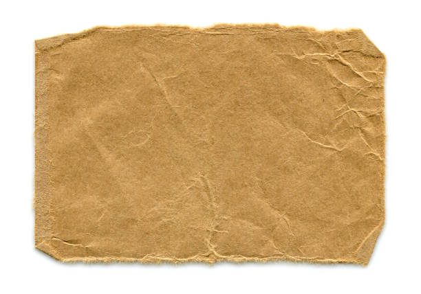 Cut or torn brown paper background textured isolated stock photo