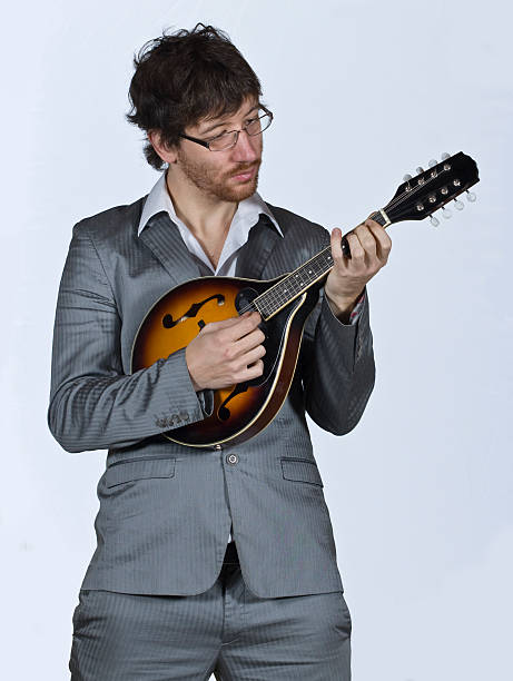 istock Musician playing his guitar wood 147271987