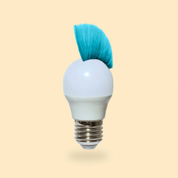 istock A daring playful electric light bulb with Mohawk hairstyle. 1472719994