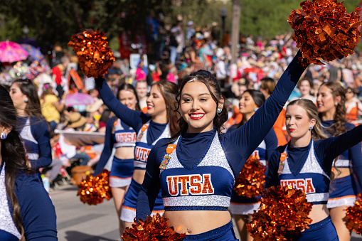 San Antonio, Texas, USA - April 8, 2022: The Battle of the Flowers Parade, The University of Texas at San Antonio Marching Band performing at the parade