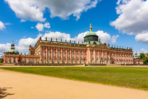 Potsdam, Germany - May 2019: Medieval New palace (Neues Palais) in Potsdam park on a sunny spring day