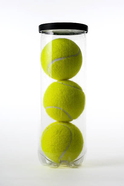 Can of Tennis balls Can of yellow fluorescent tennis balls on white seamless tennis ball container stock pictures, royalty-free photos & images