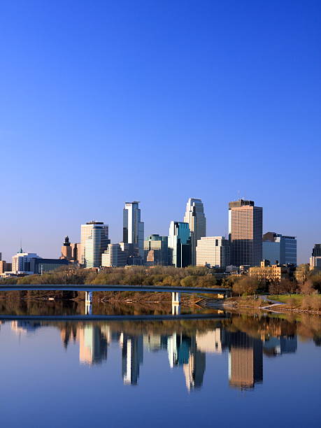 istock Downtown Minneapolis with blue sky vertical view 147272623