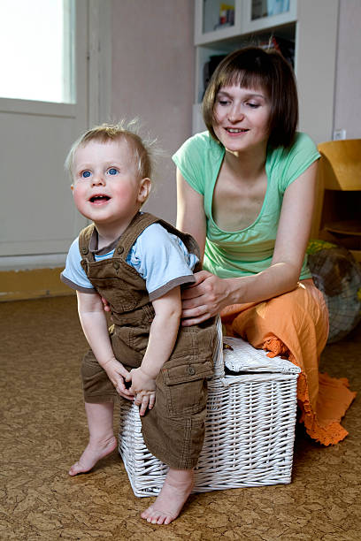 istock Mother and her cute blond baby 147272724