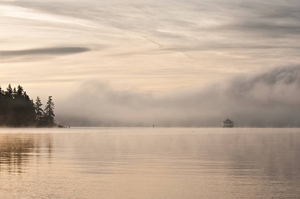 Bremerton Ferry Bremerton ferry coming out of the fog near Point White bainbridge island photos stock pictures, royalty-free photos & images