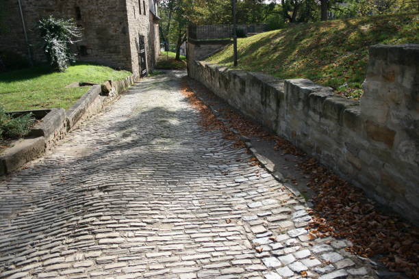 istock Stone road in the old city 1472727703